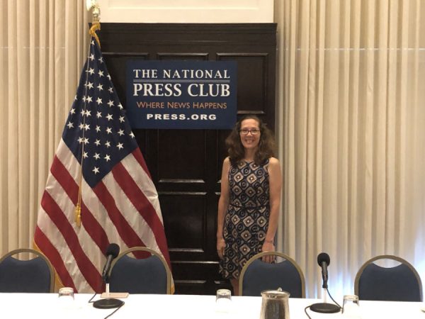 Anne Loehr from the center for human capital innovation standing behind chairs and ready to present at the PR Summit DC 2019